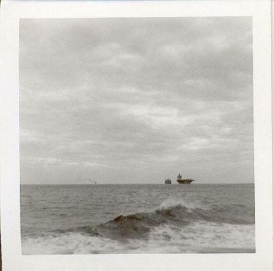 Here is a series  of six photos taken from the Semmes as she steams past the 
USS Enterprise CVN-65 as she takes on diesel from the USS Neosho AO-143.   
We were all in a rush to get somewhere.    
The Big E was in Cuban waters 24-Oct-1962 to 3-Dec-1962.  The Neosho was 
in Cuban waters 24-Oct-1962 to 22-Nov-1962.

