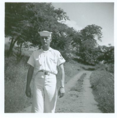 Tom Ringate, strolling down a path on St. Thomas.  I think we were finding 
our way up to some bar on top of the mountain.

