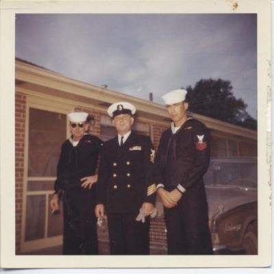 From left to right is Boyd Hensley  ET1 Ken Tavender FTC ? Omer RM1, they are 
standing next to the house we all lived in New Orleans.
