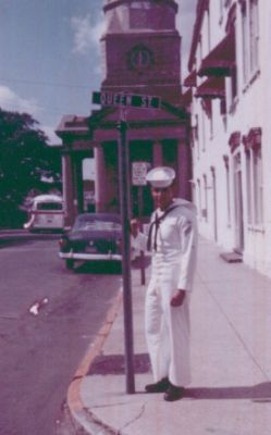 Here's a picture that we couldn't resist taking on Queen Street, in 
Charleston, 1963. 
This is a few blocks away from the 2002 reunion.

Mitch
