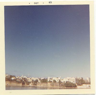 There are so many pictures of the memorable liberty in Santo Domingo because 
of the shortage of American Currency.  Warren Basford and I were so broke 
that we wound up trading personal effects (camera, cigarettes etc) for rum 
and the pleasure of some young ladies? company.  I didn't want to lose the 
pictures on the roll so I shot everything in site just to use them up.
