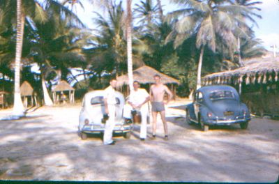 On one trip to San Juan a bunch of us rented some Vespa motor scooters and 
rode around the island.   
On this trip we got smart and rented VW's. 
Somewhere on the middle of the island was a rain forest and "Houdini" picked 
some finger bananas. 
There was a restaurant also there and I ate Lobster for the first time.   
"Loved It".   

 Alex
