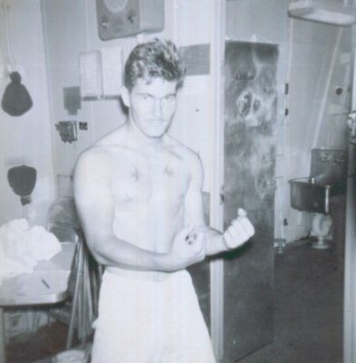 Bob Mitchel showing off his birds of freedom ...
I think the title of this picture should be..... 
"If anyone pukes in my whitehat again, I'm gonna kick their butt."   
I think I was trying to flex my muscles, or show off my new "McCall haircut".   
Anyway what I wouldn't give for those "abs" now.
