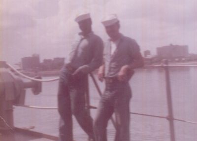 Here's a pic of my good friend Joe Butler. 
Looks like we are pulling into San Juan because there's a smile on our face. 
If we were pulling out, we'd be hung over, head pounding, and our eyeballs 
would be bleeding. 
Anyone in the Philly area that can look for a Joe Butler in the directories? 

Mitch
