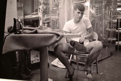 Desposito. He has never been to a reunion.  Notice the iron on the table.

