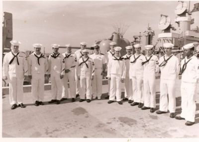 The last personnel inspection was held about 6 months prior to decomissioning. 
I was the leading ASROC Gunnersmate at the time in CA division.  
She was my favorite ship of the 4 I was on and was always at her best with boilers lit and underway.
