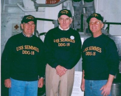 Here's another picture on the USS Yorktown. Mitch, Captain Alexander, and 
Joe Miele. Joe and Mitch were in the Deck Division together. Joe was from 
Brooklyn and Mitch from "Jersey". So we had to stick together!  It looks like
Captain Alexander is thinking, "Did I really let these two characters 
re-enlist?"
