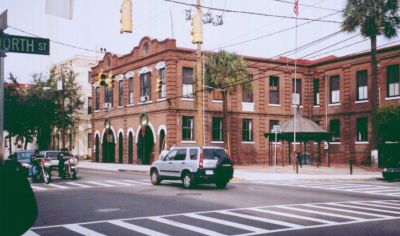 Here's another reunion shot. Nice picture of the Charleston Firehouse. This 
was taken from our hotel where we all stayed. Interesting to think that the 
USO was across the street from the firehouse, and we all walked past the 
hotel 38-40 years ago! Who would have thought we'd all be together again a 
few buildings away!
