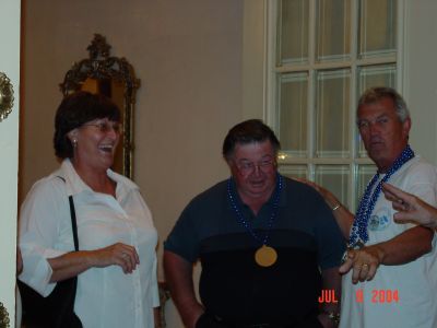Tom Camann welcoming Toni and Charles Stephens from Goose Creek, SC at 
Registration, Friday afternoon.
