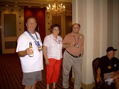 Charlie Layus (dear in the headlights look) chatting with Jackie and Tom McLamb
