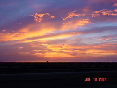 Sunset on Lake Pontchartrain......the Bishops heading back to campsite after 
a long, fun day at the reunion.

