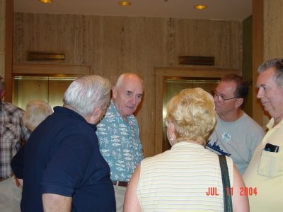 Ron and Bonnie Beinhaur, Keith Cottrell, and Charlie Layus greet 
Capt Alexander.
