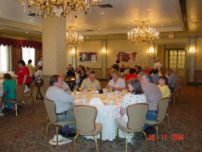 USS Semmes shipmates enjoying Mimosas, local drink of the Jazz 
Brunch.......OJ and Champagne...easy on the OJ.

