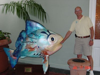 Eric Bishop with one of the famous New Orleans FISH.  These FISH were made 
by local businesses for a charitable event and now displayed all over 
the city.
