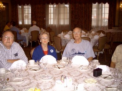 Gene Hopper, Joyce (Jim's girlfriend), and Jim Ferguson.
