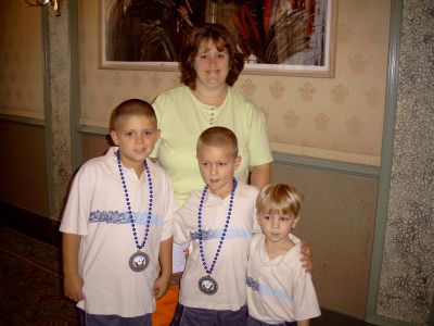 Charlie and Karen Layus's daughter Kelley and grandsons Brant, Brock, and 
Brody Sloan.
