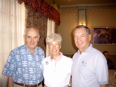 Capt. Alexander with Tracy and Ted McCourtney.
