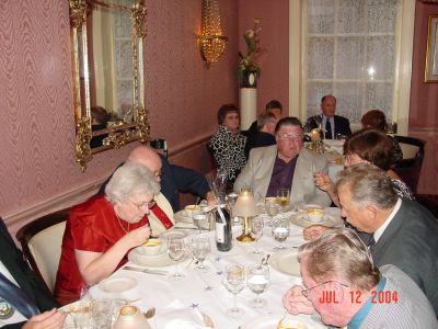 The Schroeders, the Stephens, Joe Burton and his brother, Sterling at the 
Banquet.
