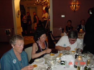 Betty Sazama, Marian Murray and Tom Hayden at the Banquet.
