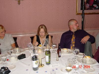 Bonnie Beinhaur, Kristen and Pat Layus, daughter-in-law and son of Charlie 
and Karen Layus at the Banquet.
