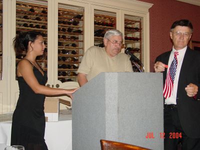 Ingrid helping Ron Beinhaur and Jerry Davis with the raffle tickets.
