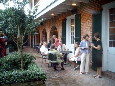 Seated: Mary & Ronnie Ashley with Dean & Judi Slone 
Standing: Valerie Ringate(pink), Sheila Rustad(blue) chatting with Marty Camann.
